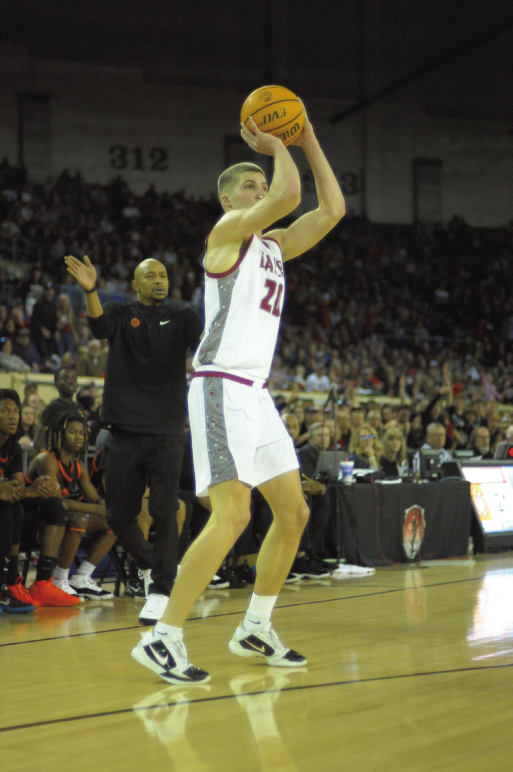 Nate Reherman takes a three-point shot in his final game as an Eagle. He finished with 13 points. Josh Burton/WDN