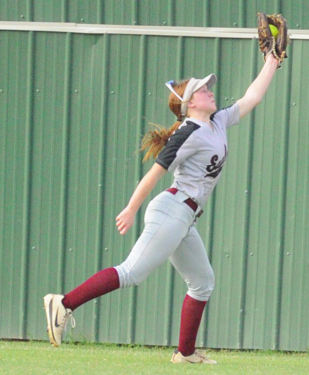 Above, Megan Mills makes the catch in center field. She also scored Weatherford’s run at Tuttle Tuesday. Josh Burton/WDN