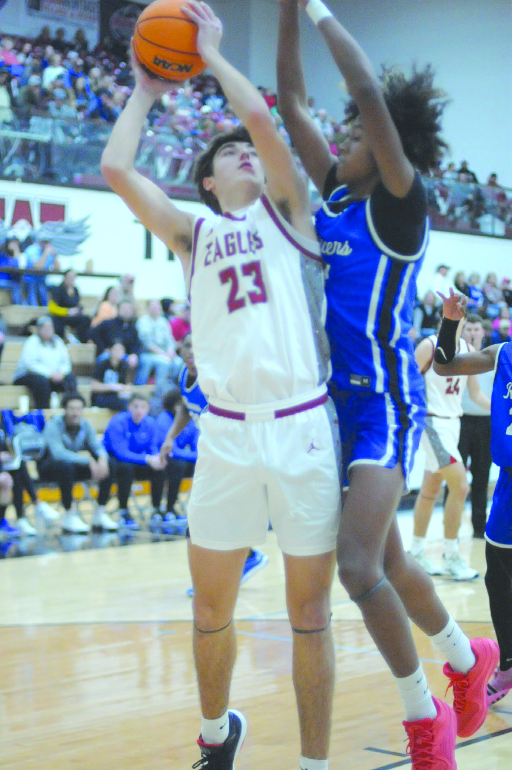 Ethan Sage scores two of his 12 points against Newcastle Friday. Josh Burton/WDN
