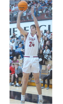 Tate Sage shoots a 3-point shot during Friday’s game against Newcastle. He finished with seven points. Josh Burton/WDN