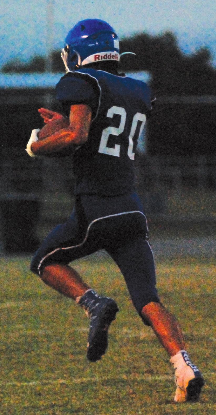 Joshua Clayton returns a punt 65 yards during Corn Bible’s game against Tipton Friday. Aubyn Phippen/WDN