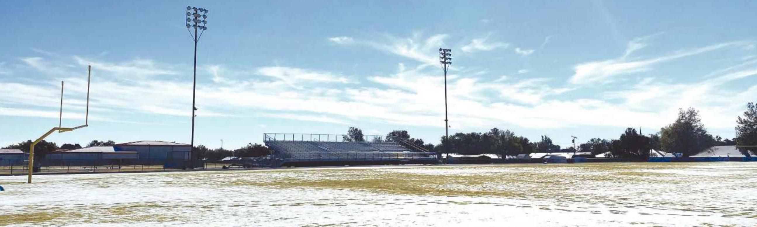 Weatherford’s football field is under partial snow/ice cover Thursday. Coach Reagan Roof says plans call for the game to be played as scheduled Friday in Weatherford. Josh Jennings/WDN
