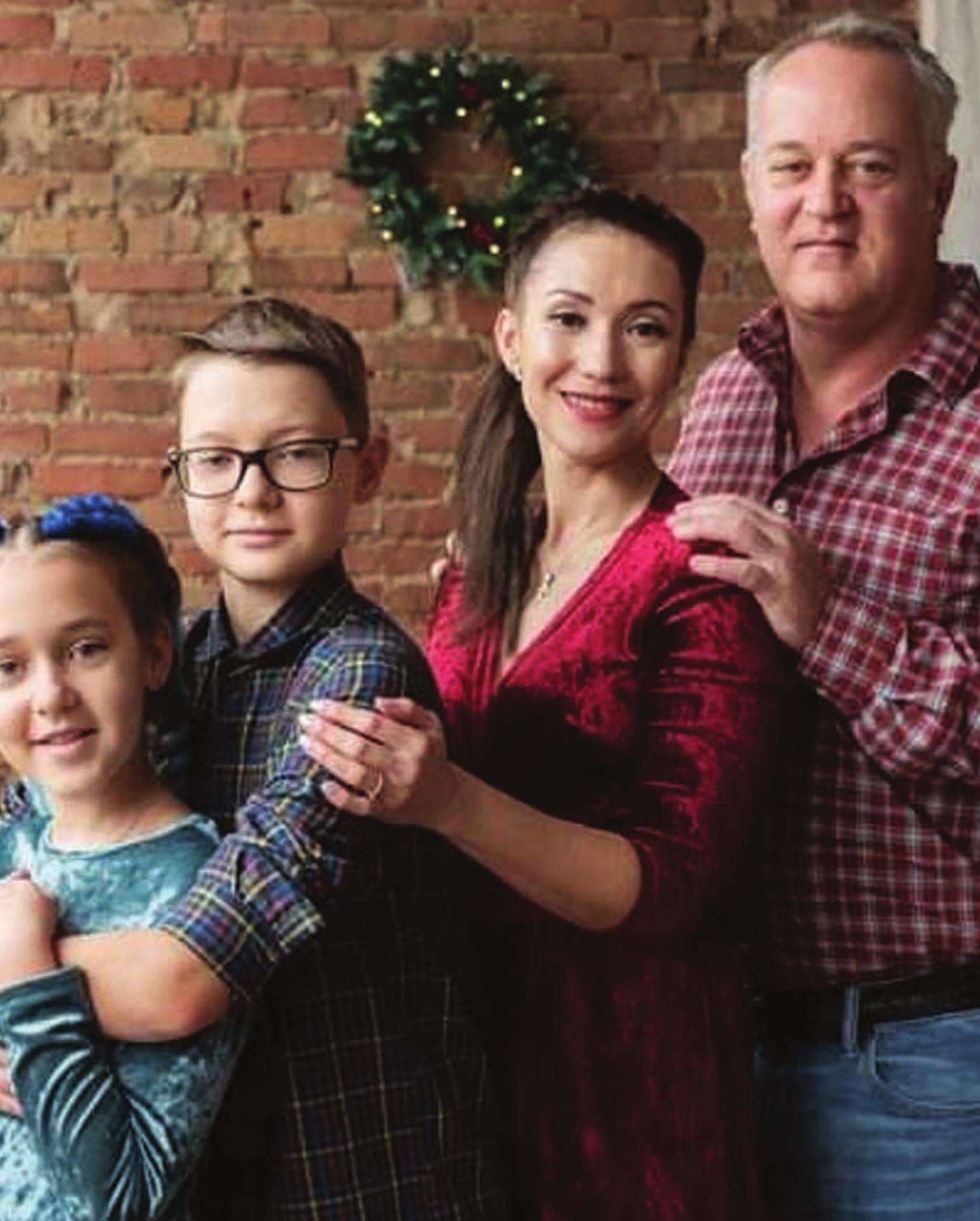 Nataliia Duren is pictured here with her family in the U.S. and her family back in Kherson. Provided