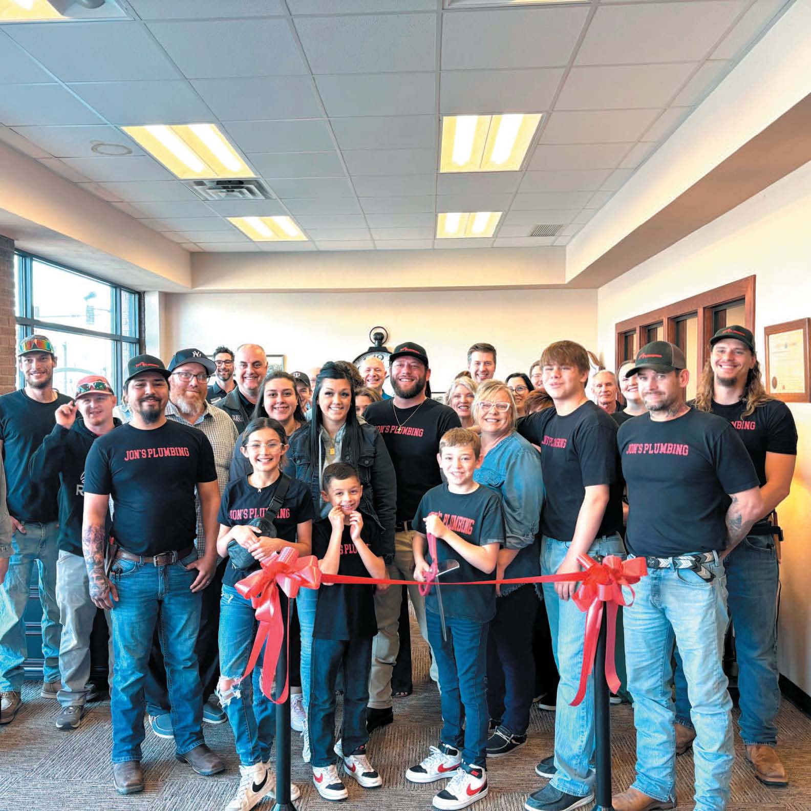 Jon’s Plumbing celebrates a ribbon cutting with the Weatherford Chamber of Commerce.
