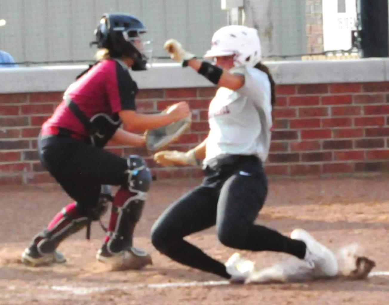 Catcher Vanessa Davis outs a Tuttle player during the September 1 game. photo provided by Lisa Pebley