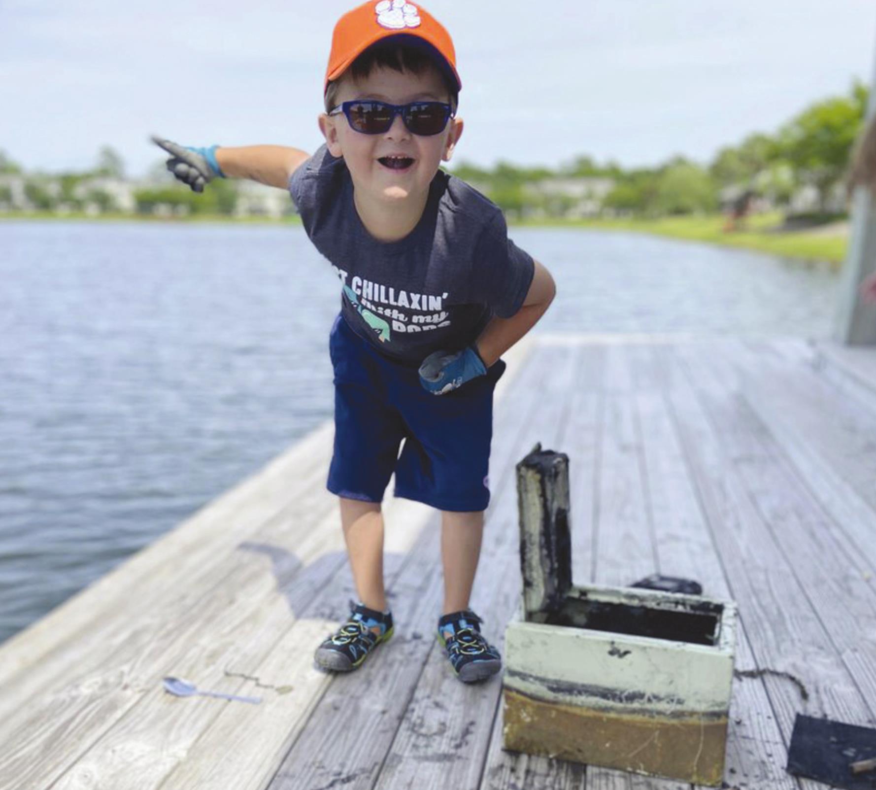 Knox Brewer, 6 of Johns Island, South Carolina, reeled in a metal lockbox, which Provided