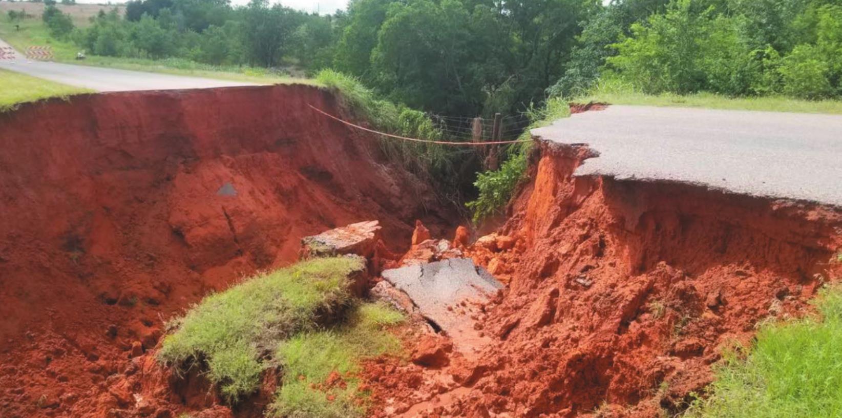 Rains last Monday and Tuesday wash out part of County Road 1040 east of County Road 2400 and south of Weatherford. Custer County commissioners discussed damage, during Monday’s meeting in Arapaho. Read full story on Page 11A. Provided