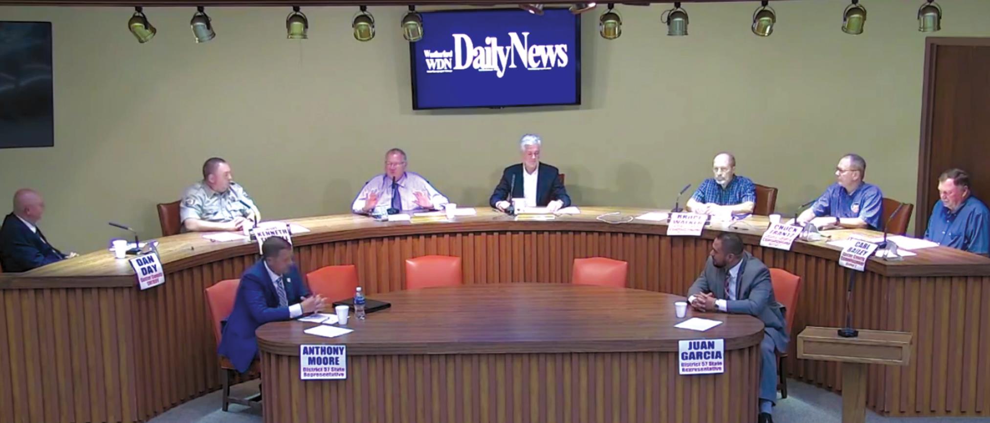 Candidates for county commission, sheriff and House District 57 participate in a candidate forum sponsored by the Weatherford Daily News.