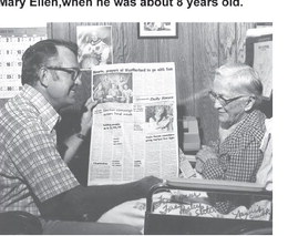 Ken Reid, publisher emeritus, shows Nannie Smith, who was Mary’s best friend and Tom’s former babysitter, the newspaper story of the Apollo-Soyuz mission in the Weatherford Daily News.