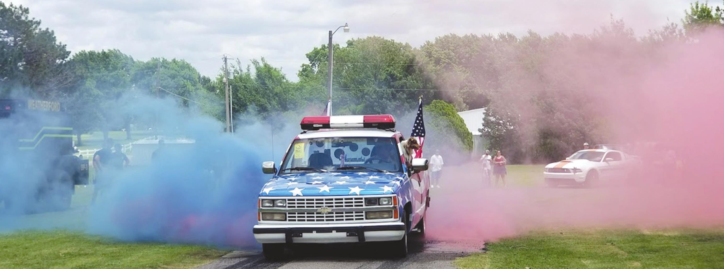 This vehicle does a burnout during a previous Heartland Cruise Car Show. Provided
