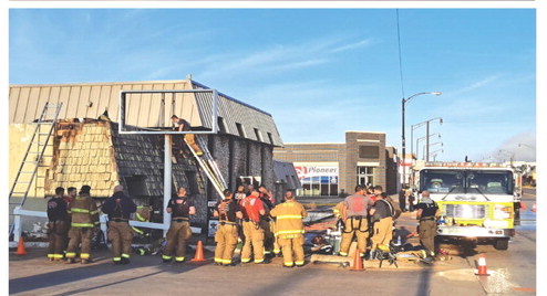 Weatherford Fire Department Station 1 responded to a fire at 202 E. Main St. during early morning hours March 30. Top photo at left, shows smoke coming from the abandoned business building as firefighters were arriving. Bottom photo left, firefighters inspect the damage. Bottom right shows damage to the outside of the building. The cause of the fire has not been released.