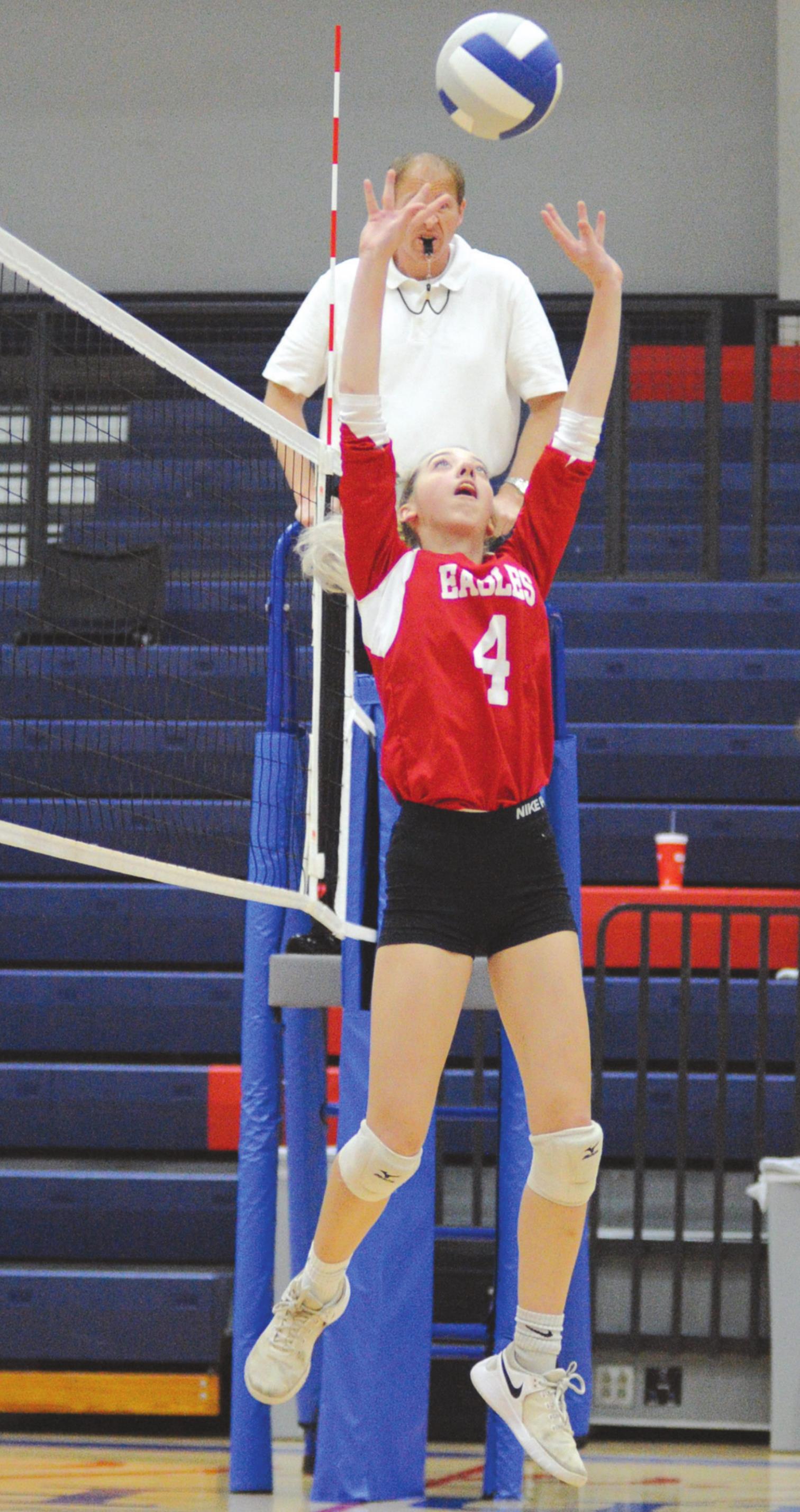 Josh Burton/WDN Sydney Barr sets a volleyball for an attempt to get the ball over the net during the 2019 Class 4A Regional Tournament.