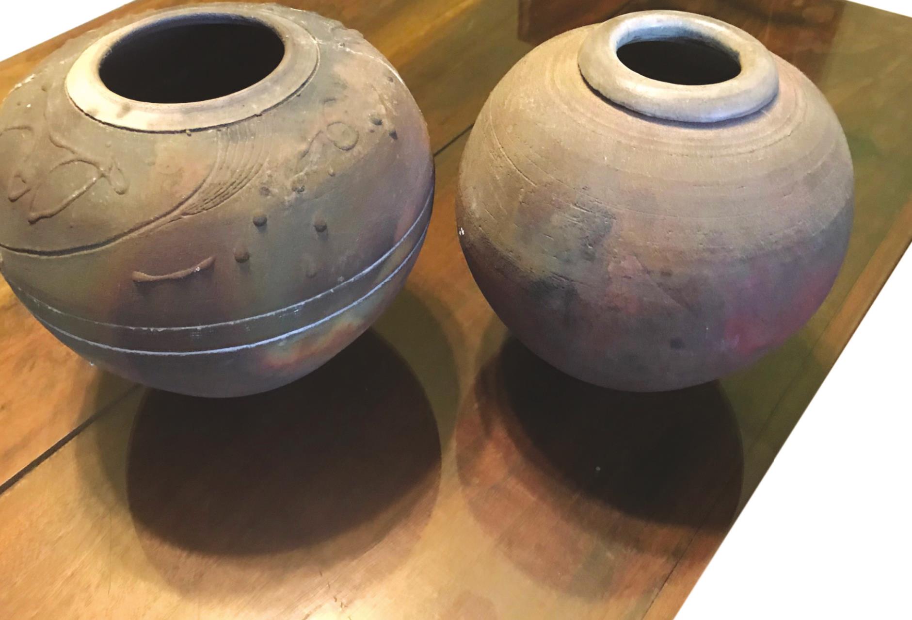 Provided This photo shows two pots made by Stephen Walker.