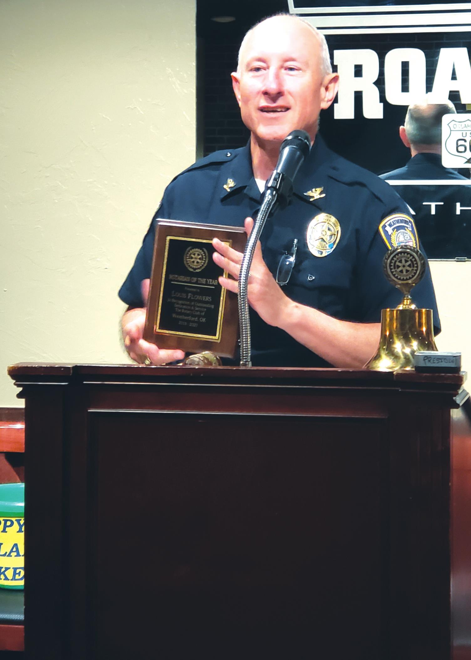 Weatherford Police Chief Louis Flowers accept the Rotarian of the Year Award. Flowers said, “It’s a beautiful day to be in Weatherford, and if you can live anywhere, why not Weatherford.” Leanna Cook/WDN