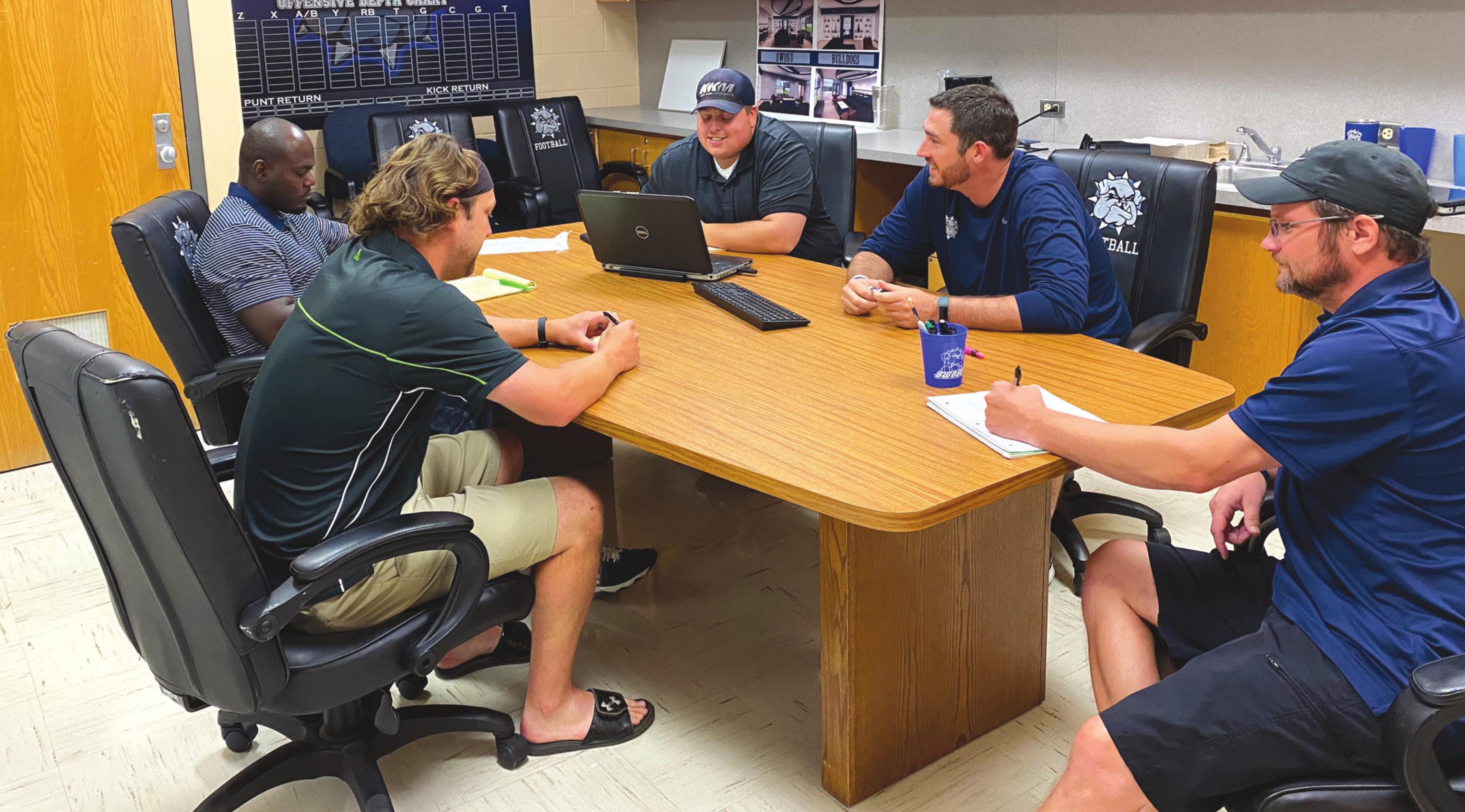 SWOSU football coaches Ruzell McCoy, Tyler Hennes, Jake Warehime, Colin MaQuillan and coach Chet Pobolish discus plans and protocols for COVID-19. Josh Jennings/WDN