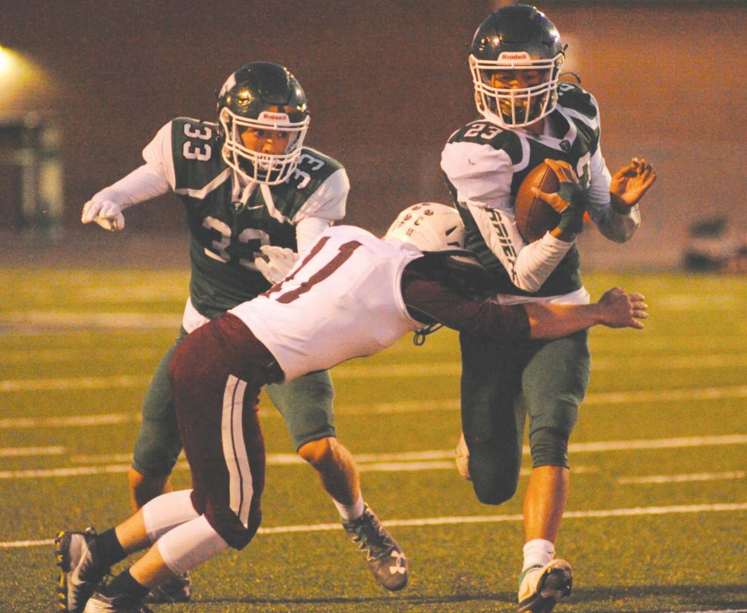 Ethan Hamberlin breaks a tackle during Thomas’ game against Sayre, which the Terriers won 28-6. Aubyn Phippen/WDN
