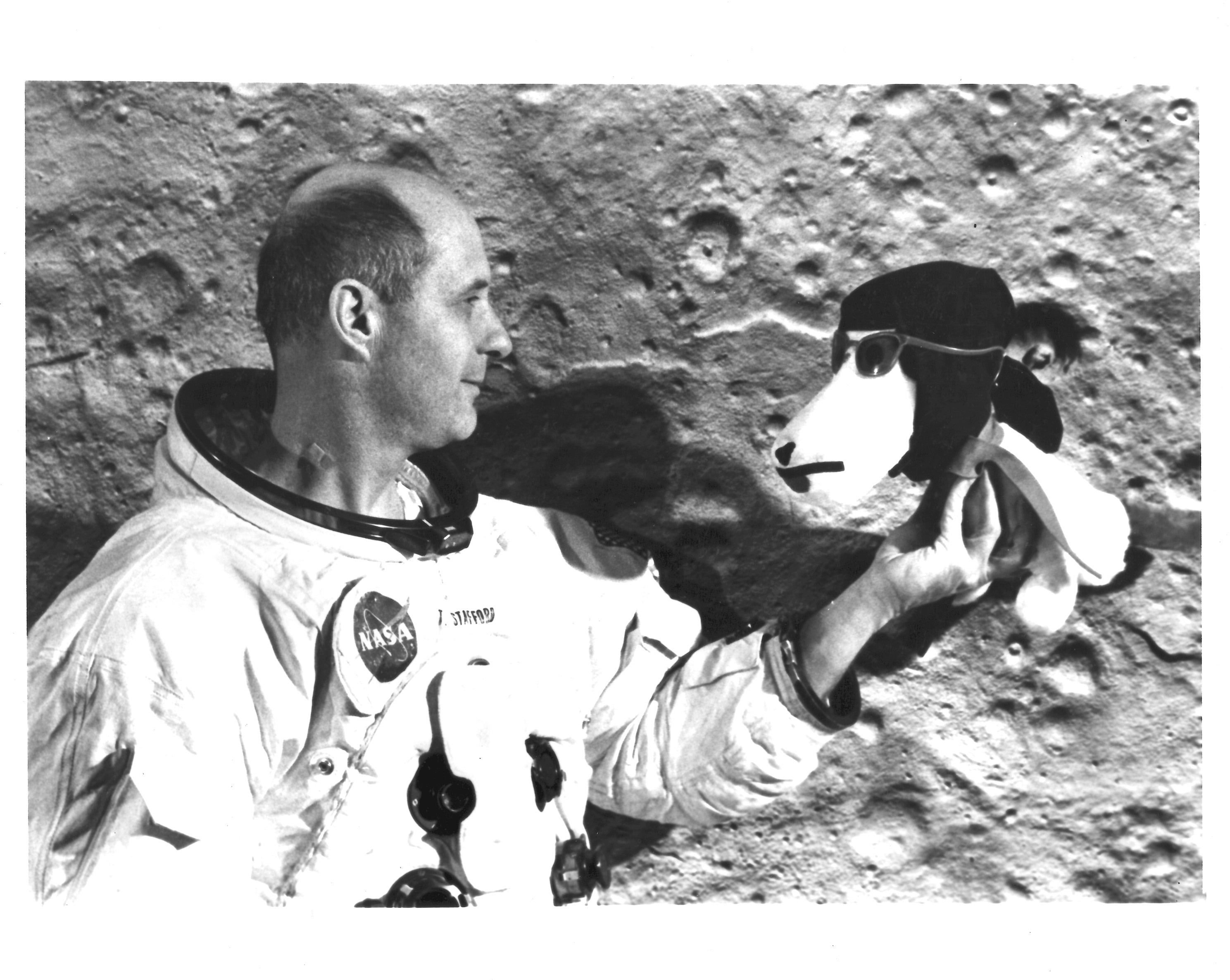 SNOOPY PROUD: Gen. Tom Stafford holds up a stuffed Snoopy, which he chose to nickname the Apollo 10 lunar module.