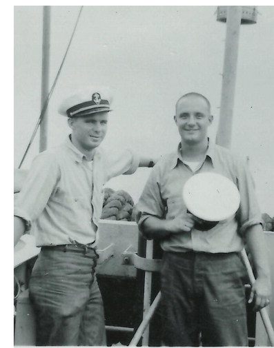 Stafford, right, pictured with a fellow crewmate while attending the Naval Academy.