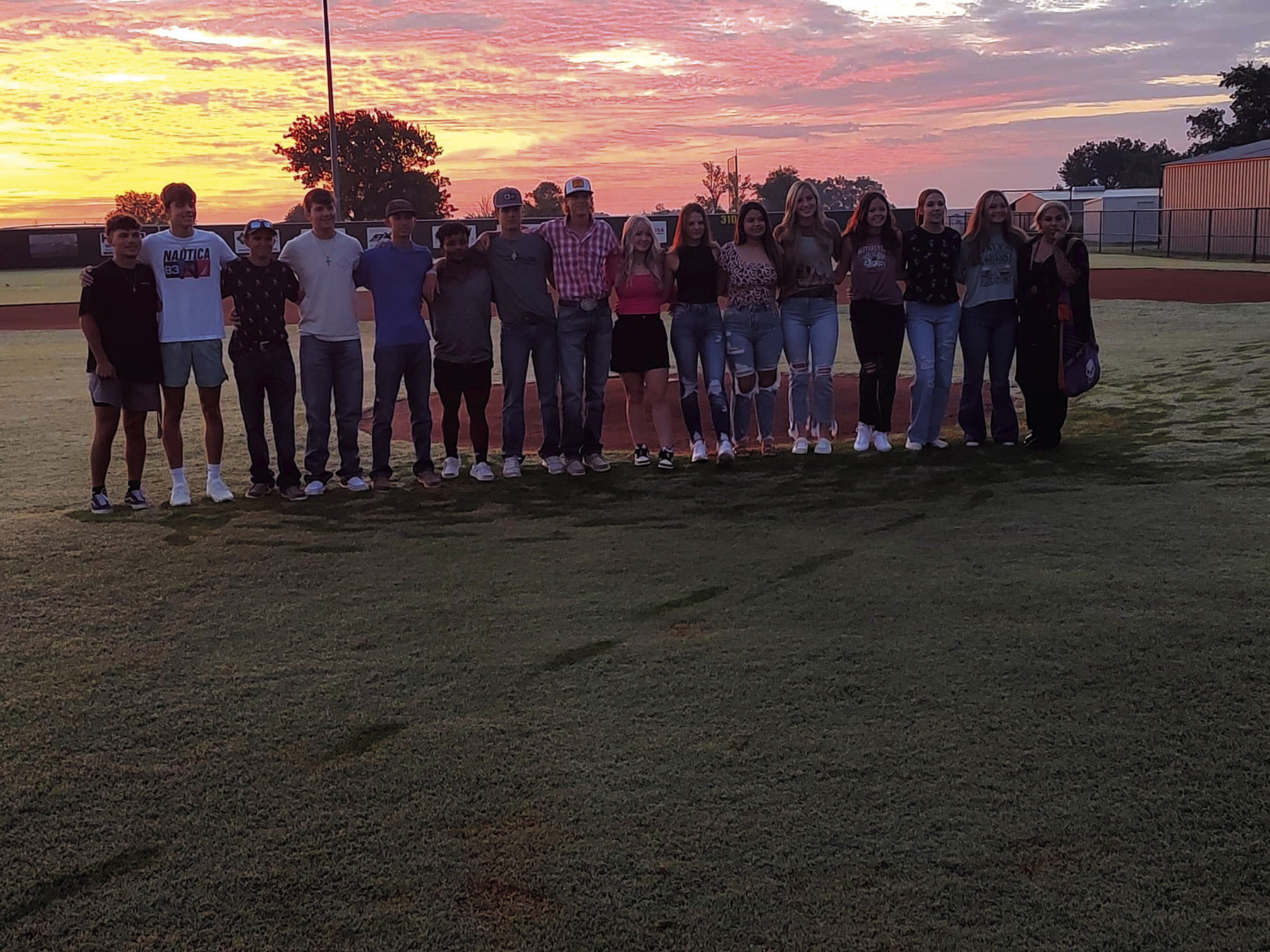 Provided The Hydro-Eakly senior class gathers Wednesday morning to watch the sunrise before their first day of class. The group also enjoyed donuts and juice before going to school.