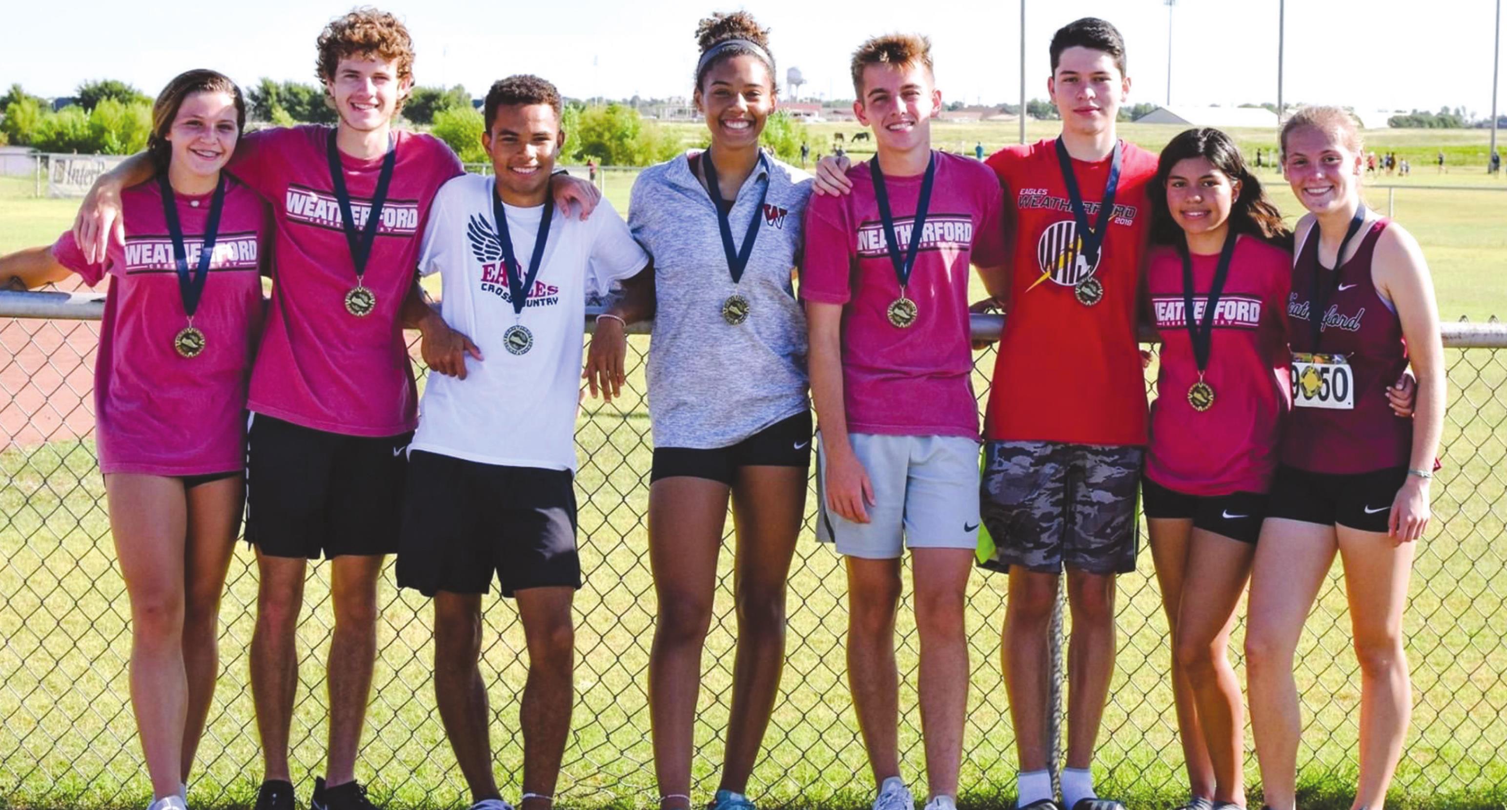 Weatherford teams finished second and third Saturday’s cross country meet at Kingfisher. From left is Jordan Hoffman, Grant Christian, Garry Rose, Kennadi Price, AJ Stevenson, Alberto Arrieta, Ana Arrieta and Morgan Mouse. Provided