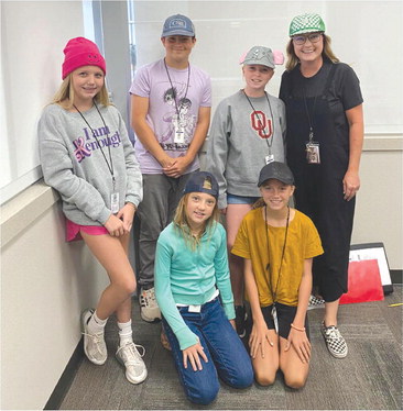 Kneeling from left is Madison Royal and Olivia Waldrop. Standing from left are Kennedy Vassar, Falon McKinley, Lakynn Merle and Shelly Warren. They all dressed up at part of Hat Day at East Intermediate, in celebration of Weatherford’s Homecoming Week. Provided