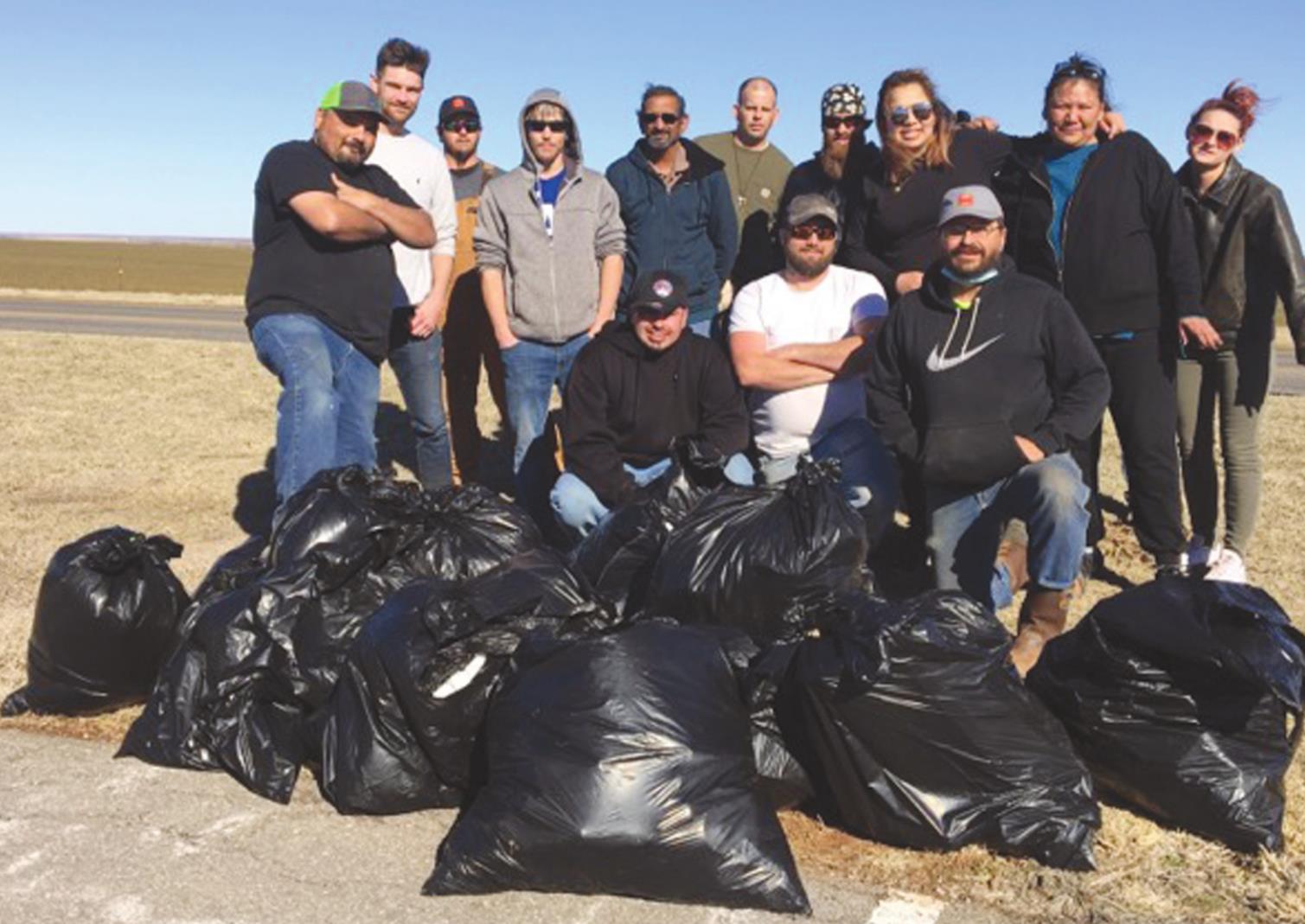 Participants in the Washita-Custer County Treat Court Proram clear litter along Crider Road in Cordell last week. Provided