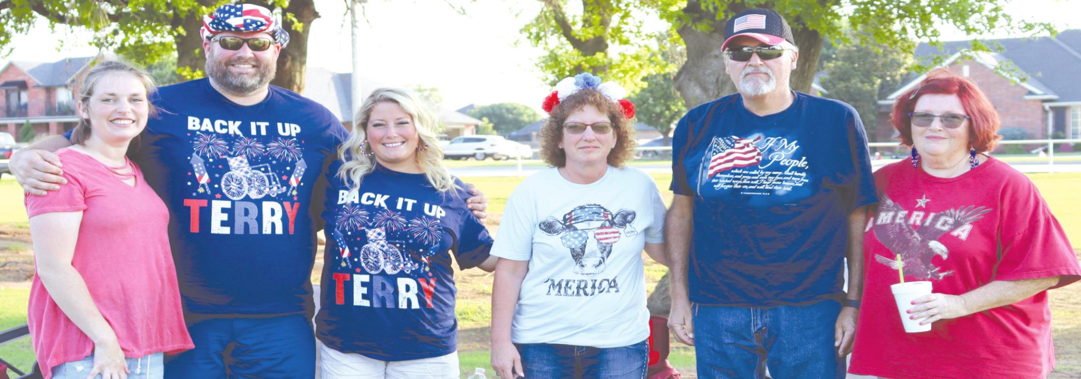 Participants in last year’s Fourth of July activities at Rader Park wore red, white and blue to celebrate. From left is Alex Bull, Ben Cury, Alicia Cury, Alice Evans, Custer County Under Sheriff Kevin Evans and Kim Chenoweth. File photo