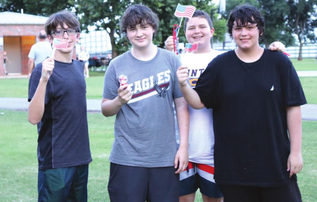 From left is Bradyn Mowles, Ethan Gunselman, Solomon McDow and Dominic Acuna enjoying pre-firework activities at Rader Park for last year’s Independence Day Celebration. On file/WDN