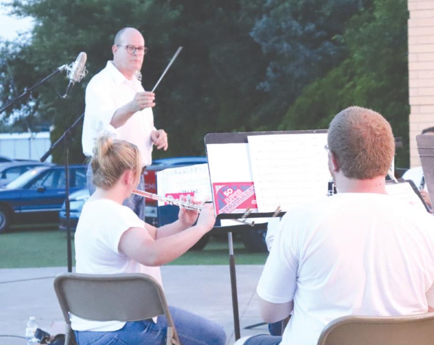 Dr. James South leads the Weatherford Community band in a series of patriotic arrangements during the Fourth of July celebration last year. On file/WDN