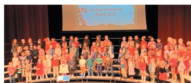 ◄ The kindergarten classes divided and took turns giving their Christmas concert Monday night in the Performing Arts Center. One group performed at 6 p.m. and the other at 6:45 p.m. Ashley Adams and Jenna Zuniga/WDN
