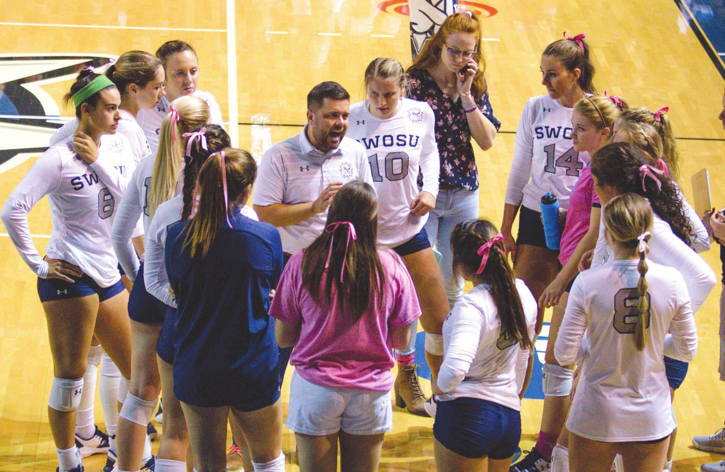 Provided SWOSU head volleyball coach Josh Collins gives his team a pep talk during a home volleyball game.Provided