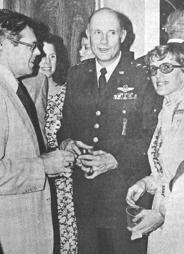 ▲Lt. Gen. Thomas P. Stafford, center, visits with Mr. and Mrs. Glenn Wallace and Terry Magill in the background during a Friday reception before the Rotary District 575 Conference banquet. April 23, 197/WDN