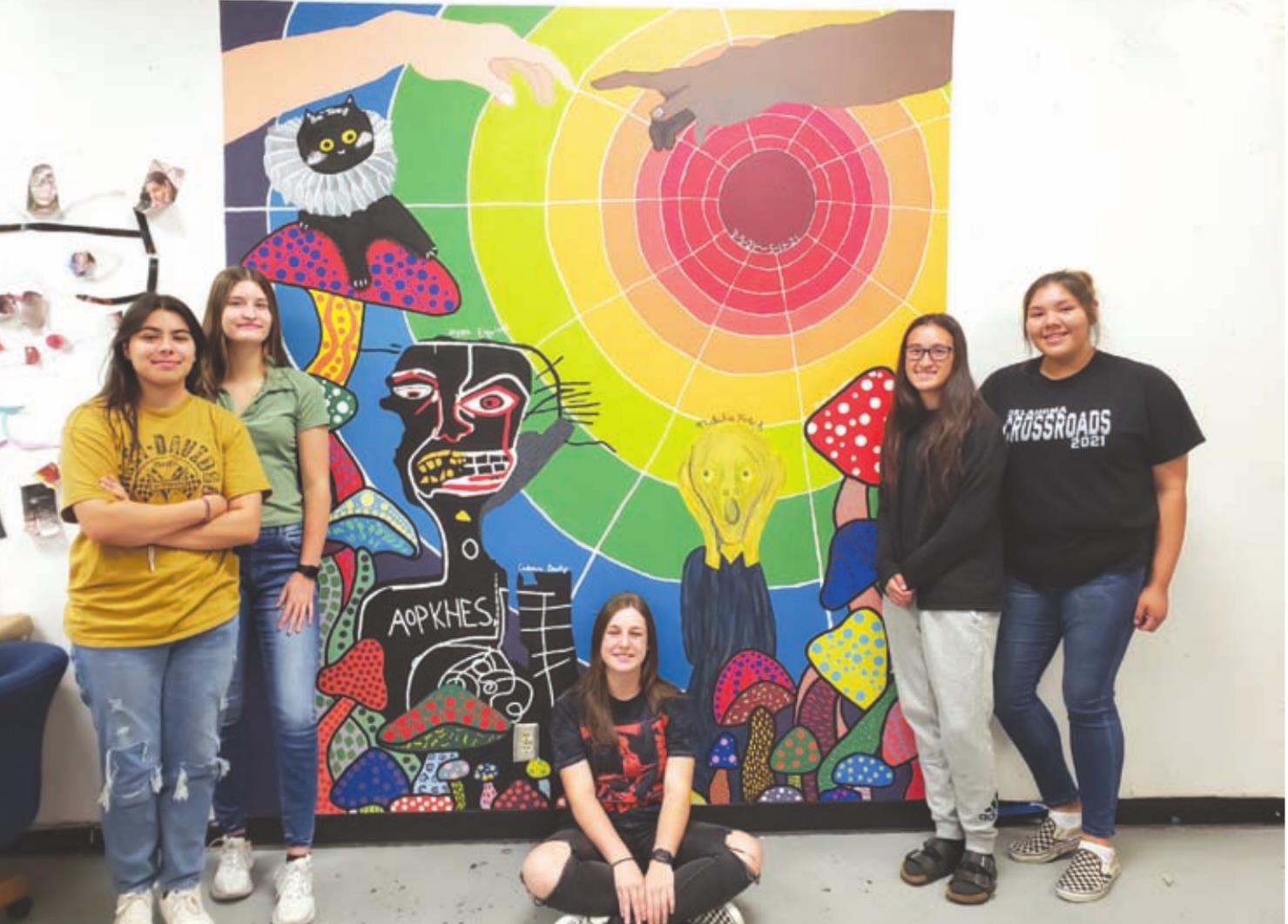 Weatherford High School Art III students, from left, Alyssa Esquivel, Cadence Dowty, Bre Toney, Nyah Busallato and Natalie Pekah created a mural in the WHS art room. Leanna Cook/WDN